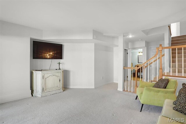 1709 Highview Circle Ct, Ballwin, MO 63021 - carpeted living area with stairs and baseboards