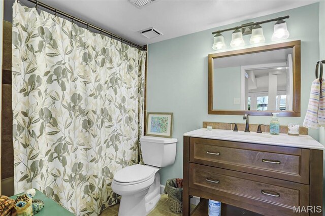 1709 Highview Circle Ct, Ballwin, MO 63021 - full bathroom with toilet, tile patterned floors, vanity, and curtained shower
