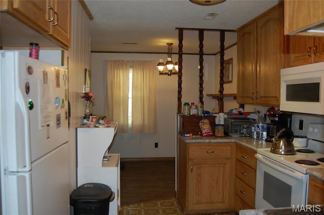 kitchen with white appliances, light wood finished floors, brown cabinetry, light countertops, and pendant lighting