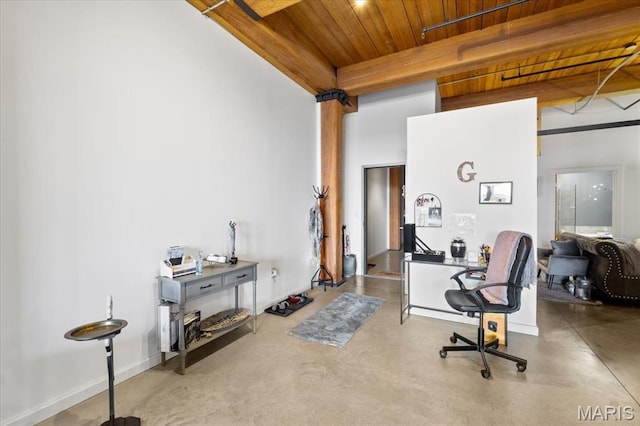 office with wood ceiling and concrete floors