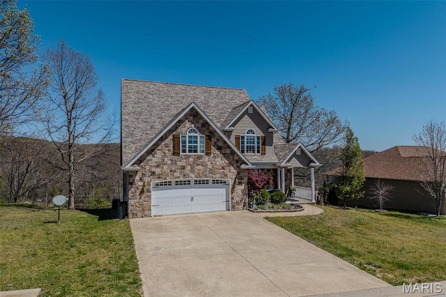 traditional-style house with stone siding, driveway, a front yard, a garage, and a porch