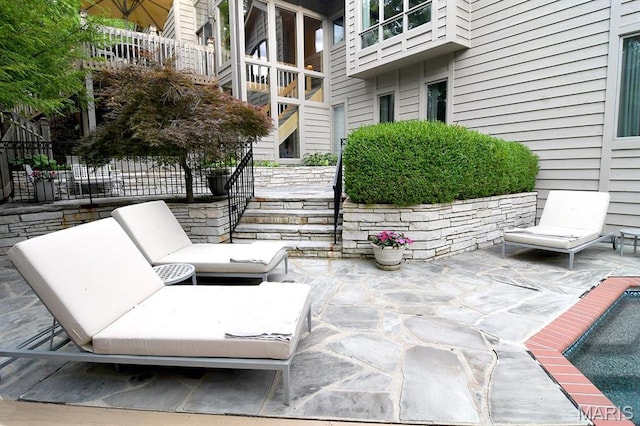 1406 W Adams, Kirkwood, MO 63122 - view of patio featuring fence, stairs, and a swimming pool