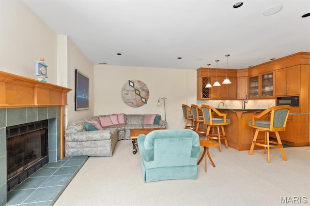 1406 W Adams, Kirkwood, MO 63122 - living room with light carpet and a tile fireplace