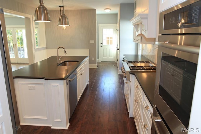 420 W Rose Hill, Saint Louis, MO 63122 - kitchen with dark countertops, white cabinets, dark wood finished floors, and stainless steel appliances