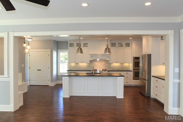 420 W Rose Hill, Saint Louis, MO 63122 - kitchen featuring dark countertops, appliances with stainless steel finishes, dark wood-style flooring, white cabinetry, and recessed lighting