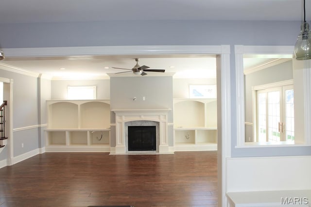 420 W Rose Hill, Saint Louis, MO 63122 - unfurnished living room featuring ornamental molding, hardwood / wood-style floors, ceiling fan, a high end fireplace, and stairs