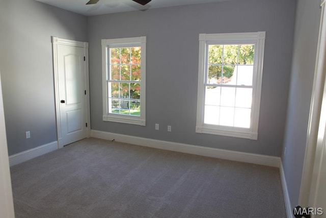420 W Rose Hill, Saint Louis, MO 63122 - empty room with a ceiling fan and carpet