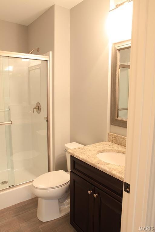 420 W Rose Hill, Saint Louis, MO 63122 - full bath featuring vanity, a shower stall, and wood finished floors