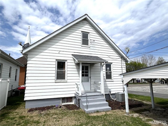 102 E 1st St, Waterloo, IL 62298 - rear view of house featuring cooling unit