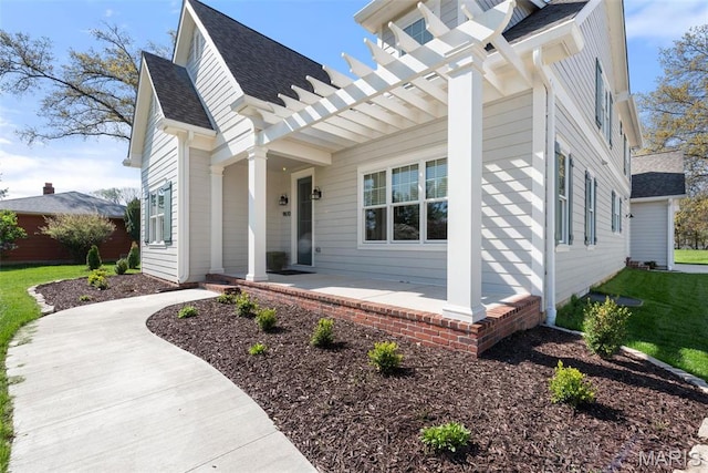 9870 E Concord Rd, Saint Louis, MO 63128 - view of front of house featuring roof with shingles, covered porch, and a front yard
