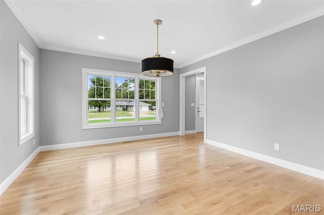 9870 E Concord Rd, Saint Louis, MO 63128 - unfurnished dining area featuring crown molding, baseboards, light wood finished floors, and recessed lighting