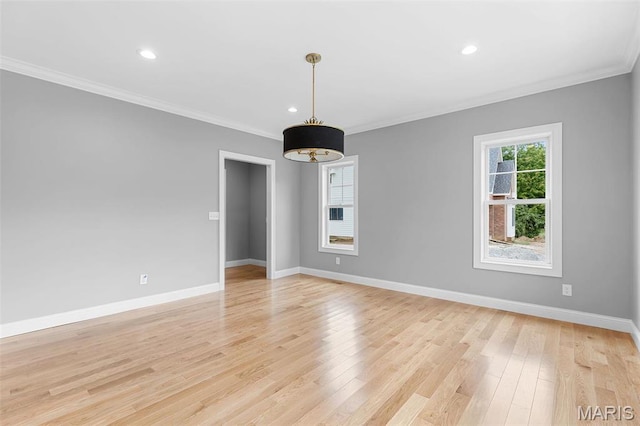 9870 E Concord Rd, Saint Louis, MO 63128 - unfurnished room with ornamental molding, baseboards, light wood-style floors, and recessed lighting