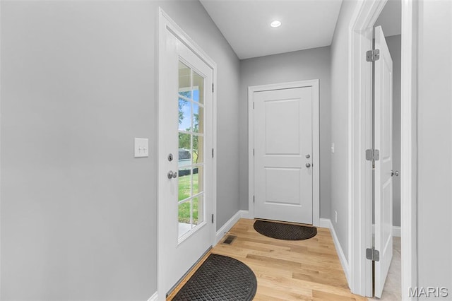 9870 E Concord Rd, Saint Louis, MO 63128 - entryway with light wood-style flooring and baseboards