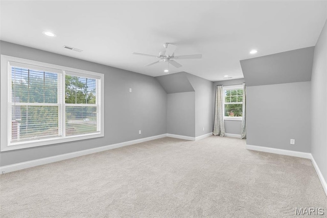 9870 E Concord Rd, Saint Louis, MO 63128 - additional living space with baseboards, a ceiling fan, light colored carpet, recessed lighting, and vaulted ceiling