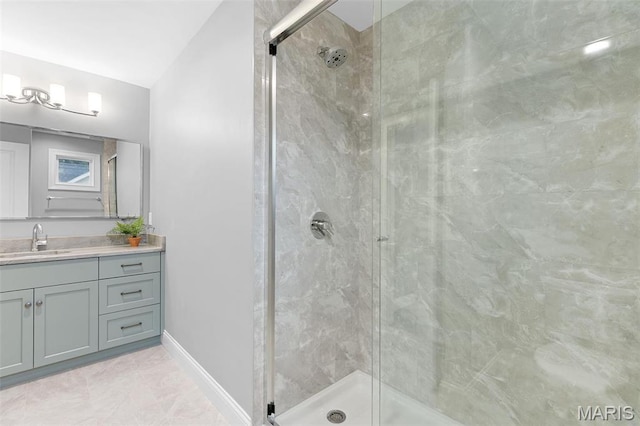 9870 E Concord Rd, Saint Louis, MO 63128 - full bathroom featuring a stall shower, baseboards, vaulted ceiling, and vanity