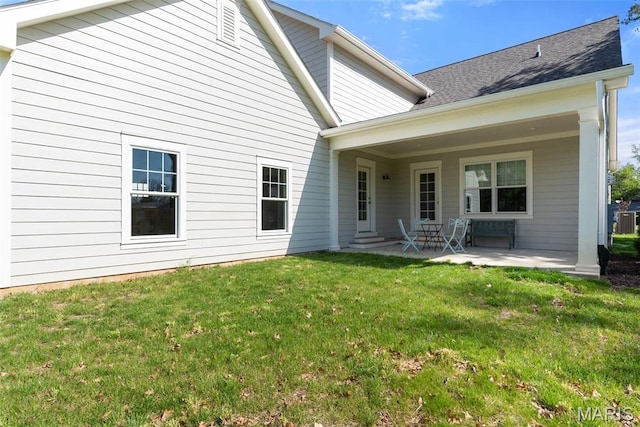 9870 E Concord Rd, Saint Louis, MO 63128 - rear view of house featuring a patio area, a lawn, entry steps, and cooling unit