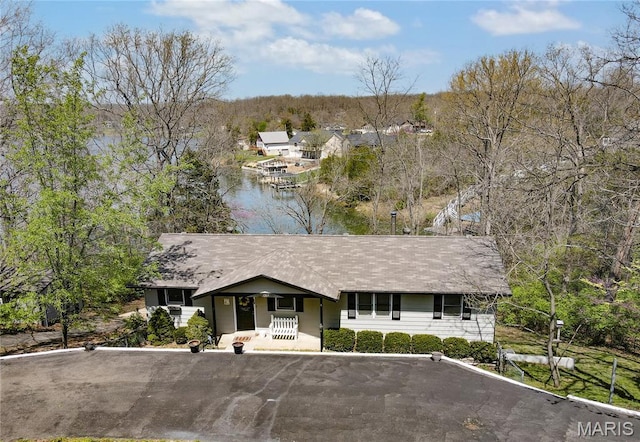1207 Napoleon Dr, Bonne Terre, MO 63628 - single story home featuring a water view and covered porch
