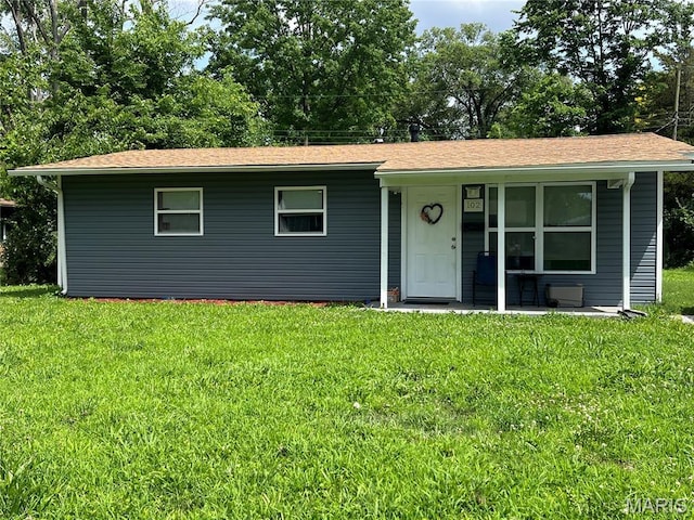 102 W Adams Dr, Cahokia, IL 62206 - ranch-style house with a front lawn