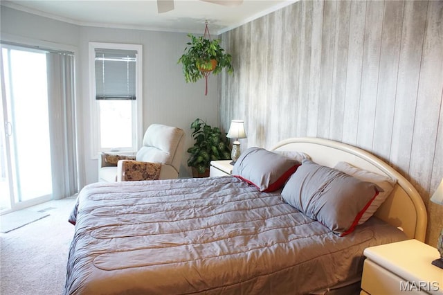 64 W Windjammer Ct Unit 2D, Lake Ozark, MO 65049 - bedroom with carpet floors, multiple windows, access to outside, ornamental molding, and wood walls