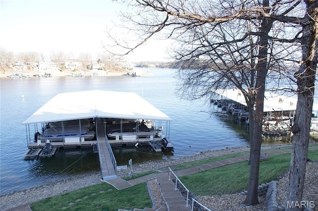 64 W Windjammer Ct Unit 2D, Lake Ozark, MO 65049 - dock with boat lift and a water view