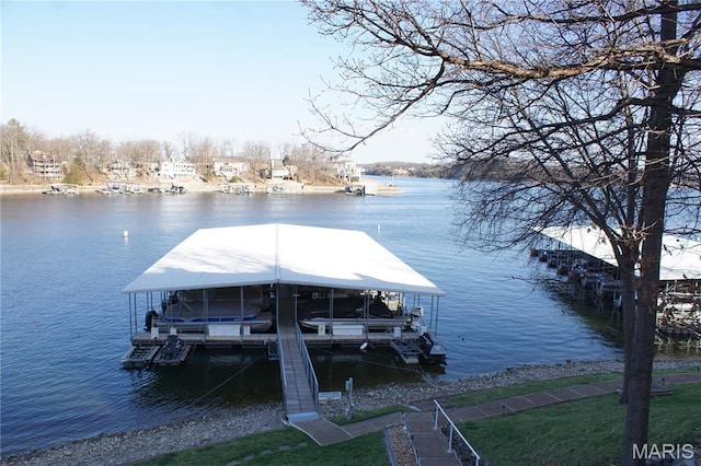 64 W Windjammer Ct Unit 2D, Lake Ozark, MO 65049 - dock area with boat lift and a water view