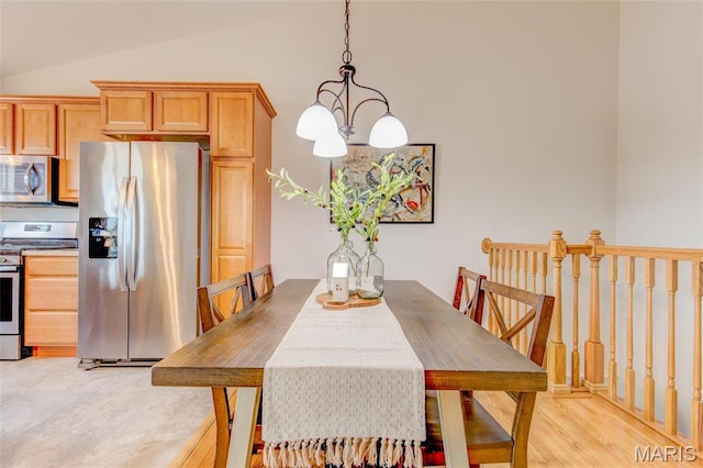 190 Bay Meadow Cir, Moro, IL 62067 - dining area with a chandelier and lofted ceiling