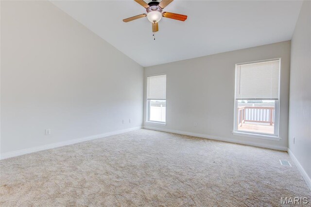190 Bay Meadow Cir, Moro, IL 62067 - carpeted spare room featuring lofted ceiling, baseboards, and a ceiling fan