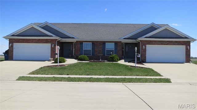 190 Bay Meadow Cir, Moro, IL 62067 - view of front of home with driveway, a garage, a front yard, and brick siding