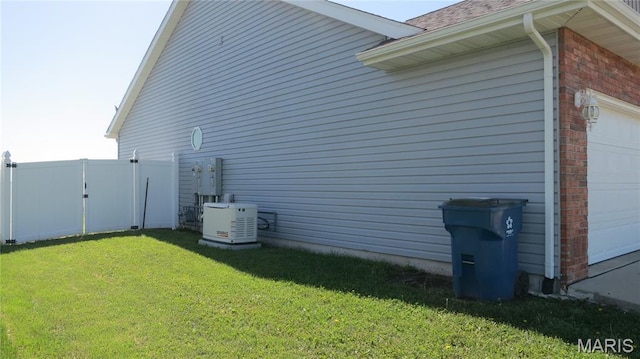 190 Bay Meadow Cir, Moro, IL 62067 - view of side of property with brick siding, a garage, and roof with shingles