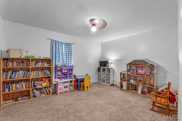 game room featuring carpet and ceiling fan