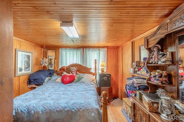 712 Nickey St, Poplar Bluff, MO 63901 - carpeted bedroom featuring wood ceiling, wooden walls, and ornamental molding