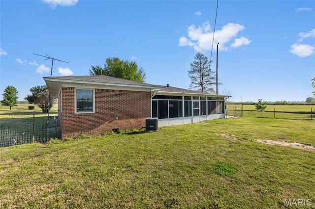 12572 Rd 516, Senath, MO 63876 - rear view of house featuring a sunroom, cooling unit, and brick siding