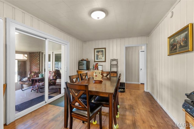 12572 Rd 516, Senath, MO 63876 - dining space with crown molding and wood finished floors