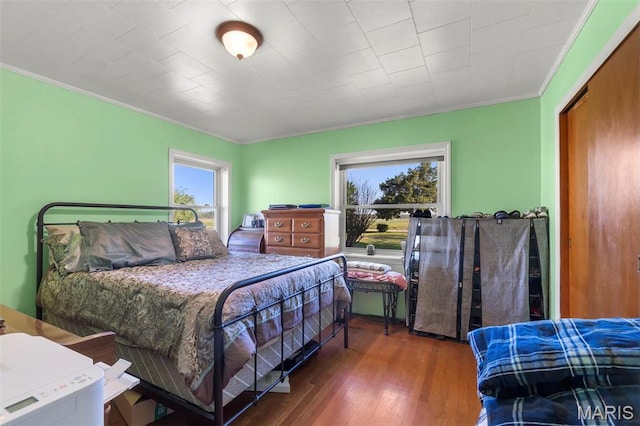 12572 Rd 516, Senath, MO 63876 - bedroom featuring crown molding and wood finished floors