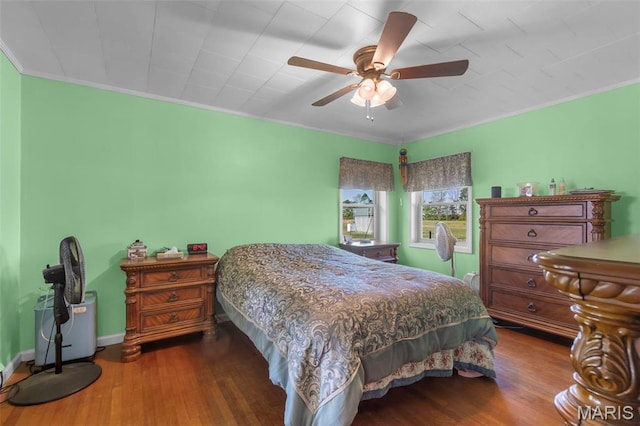 12572 Rd 516, Senath, MO 63876 - bedroom featuring ornamental molding, wood finished floors, a ceiling fan, and baseboards