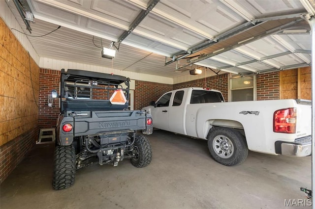 12572 Rd 516, Senath, MO 63876 - garage featuring a garage door opener