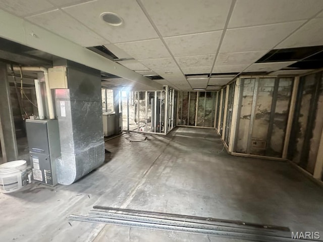 713 S Rapp Ave, Columbia, IL 62236 - below grade area featuring heating unit and a paneled ceiling