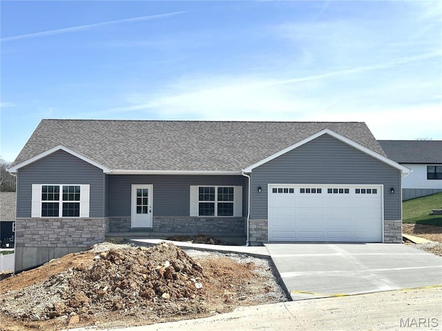 208 Pacific Ave, Union, MO 63084 - ranch-style house featuring stone siding, an attached garage, and driveway