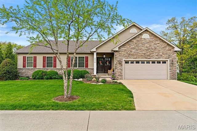 9906 Sappington Rd, Saint Louis, MO 63128 - view of front of home featuring stone siding, an attached garage, a front yard, and driveway