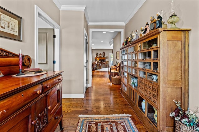 9906 Sappington Rd, Saint Louis, MO 63128 - hallway featuring dark wood finished floors, ornamental molding, and baseboards