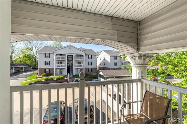 balcony featuring a residential view