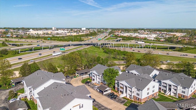 aerial view of residential area featuring a highway