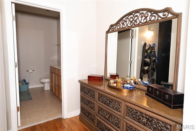 1520 Washington Ave Unit 604, Saint Louis, MO 63103 - corridor with baseboards and tile patterned flooring