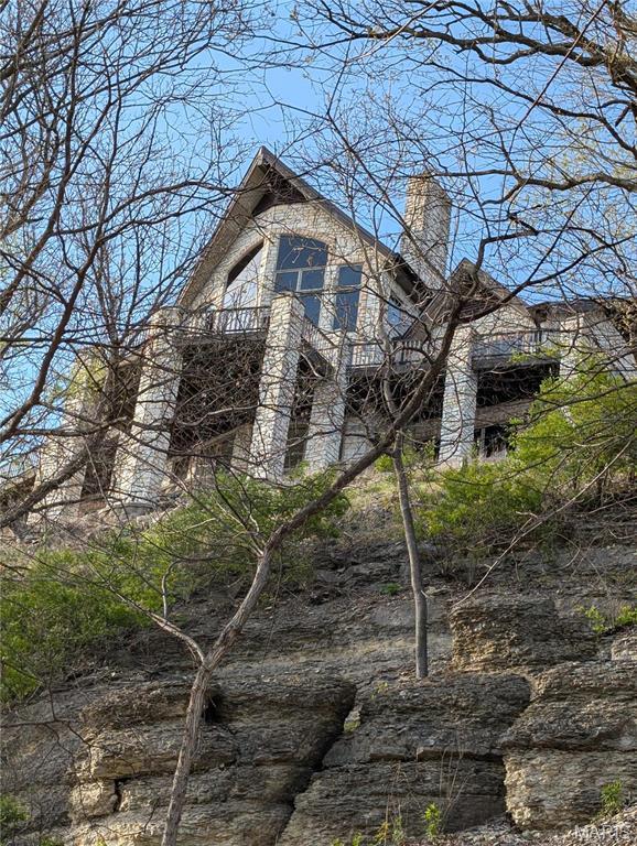 1 River Ridge Rd, Grafton, IL 62037 - view of side of property with a balcony and a chimney