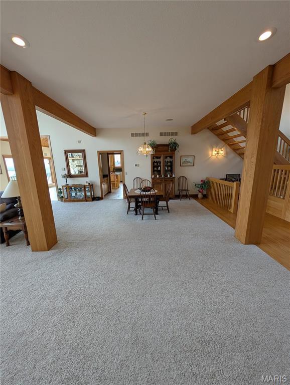 1 River Ridge Rd, Grafton, IL 62037 - dining room featuring stairway, carpet, beam ceiling, and recessed lighting