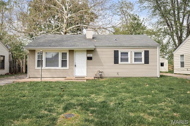 11225 Saint Shawn Ln, Saint Ann, MO 63074 - view of front facade featuring a front yard and a chimney
