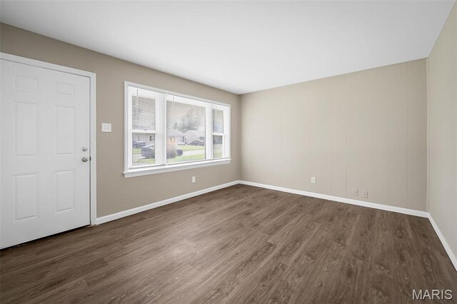 11225 Saint Shawn Ln, Saint Ann, MO 63074 - foyer entrance featuring dark wood-type flooring and baseboards