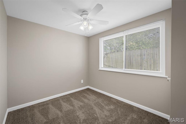 11225 Saint Shawn Ln, Saint Ann, MO 63074 - carpeted spare room featuring baseboards and ceiling fan
