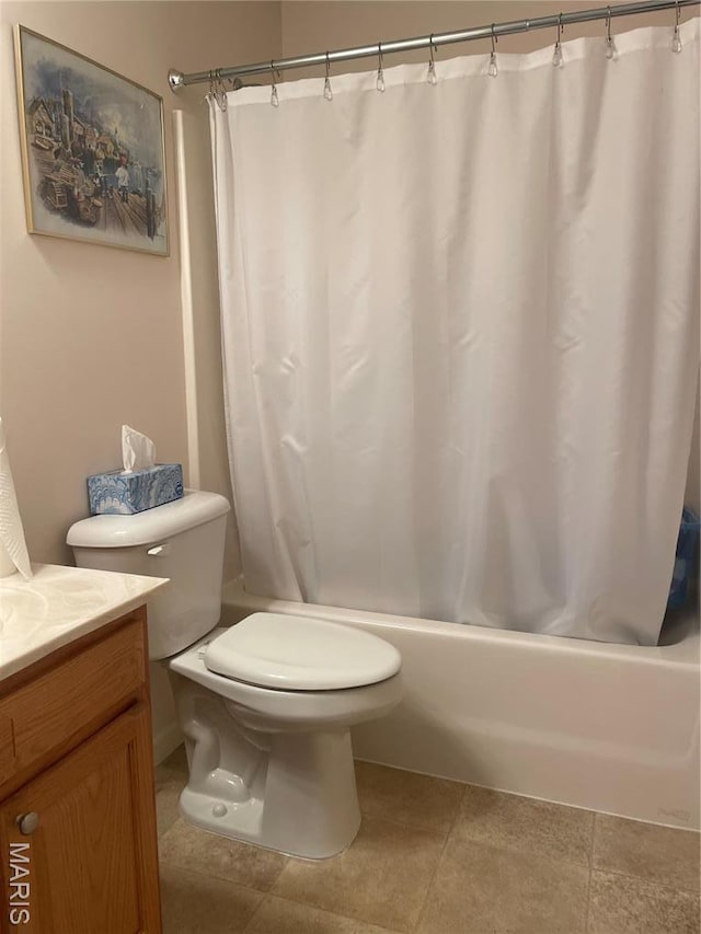 bathroom with shower / bath combination with curtain, vanity, and toilet