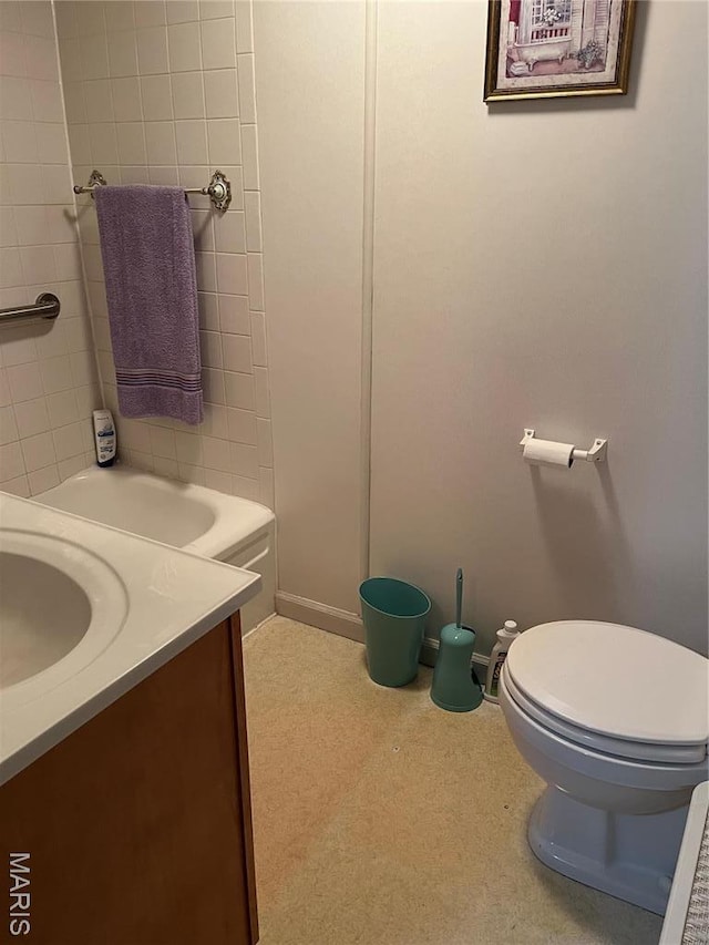 316 Bellvue St, Steele, MO 63877 - bathroom featuring toilet, vanity, and baseboards